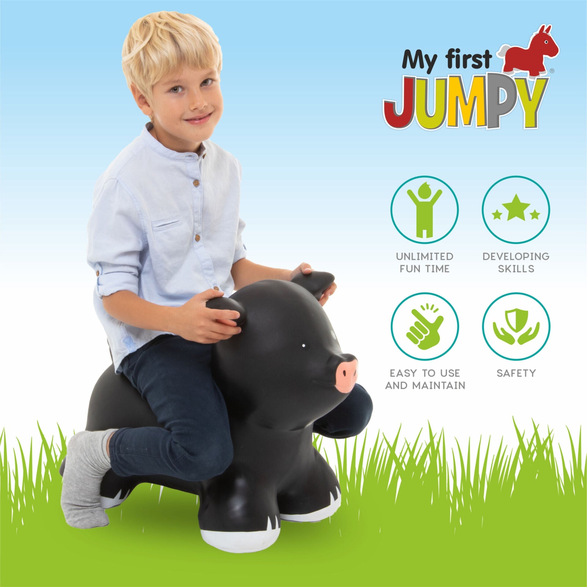 a soft black piggy jumpy toy sitting in a cozy nursery corner