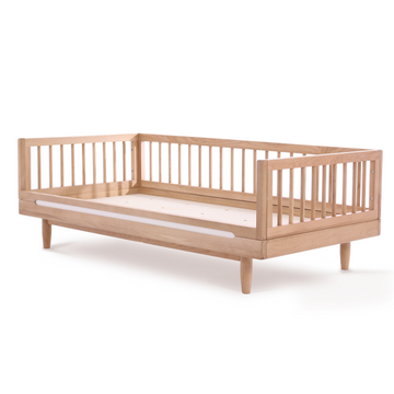 Luxury Nobodinoz solid oakwood junior bed, premium handcrafted timeless design, stylish low-level transition bed for kids, trending best-selling by Ella James at brixbailey.com