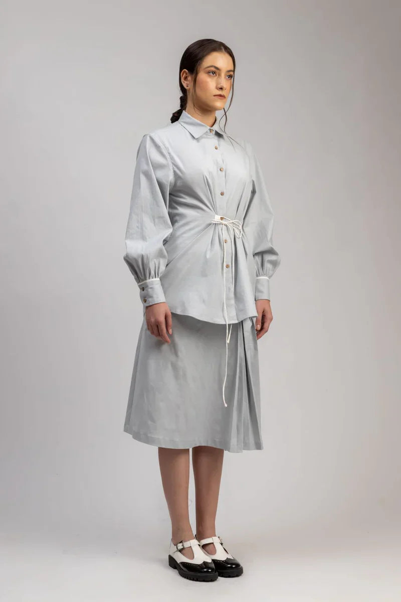Luxury oversized ice blue upcycled cotton linen shirt with tie-up detailing, stylish and comfortable, best-selling premium fashion by Bethikal at brixbailey.com