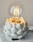 Luxury artichoke table lamp, stylish ceramic base, trending filament light for living room, study, or hallway decor by Ella James at brixbailey.com