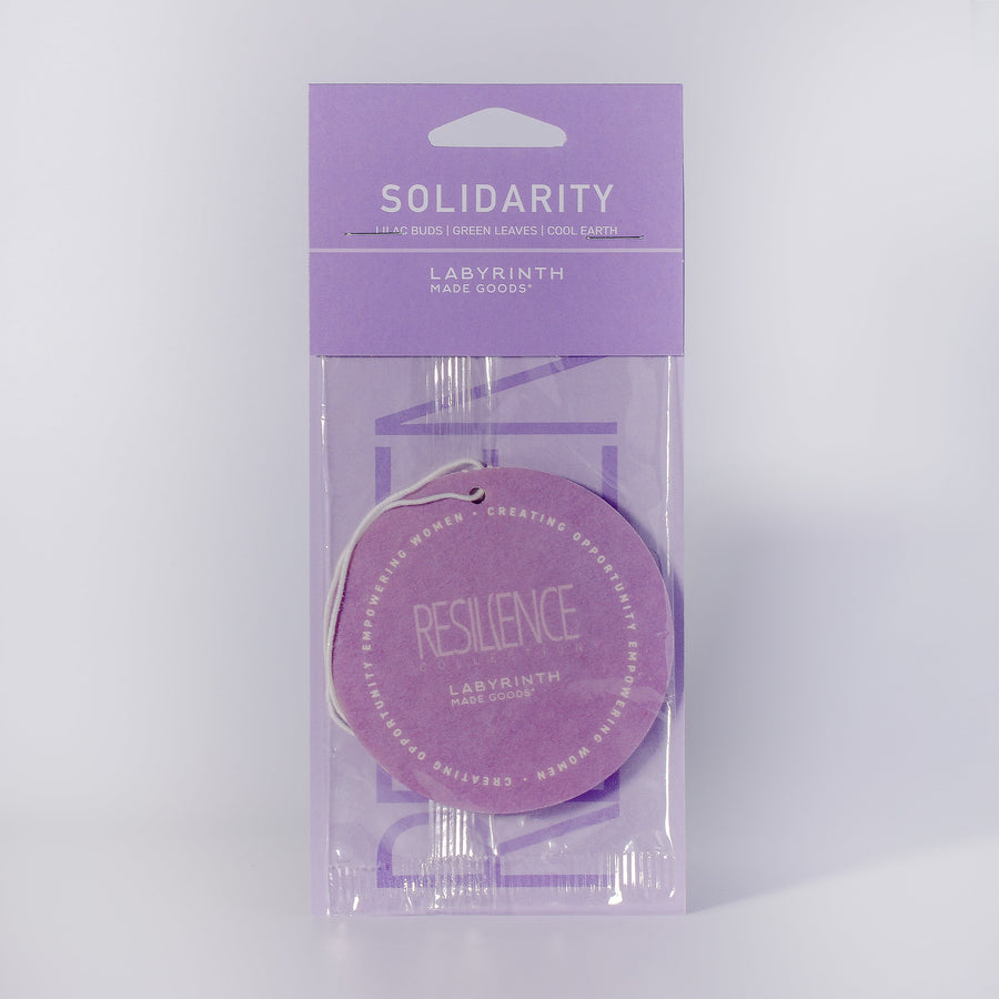 Luxury Solidarity Soy Candle with Lilac Buds, Green Leaves, Cool Earth, Handcrafted in Illinois, Resilient Glass Vessel by Labyrinth Made Goods at brixbailey.com