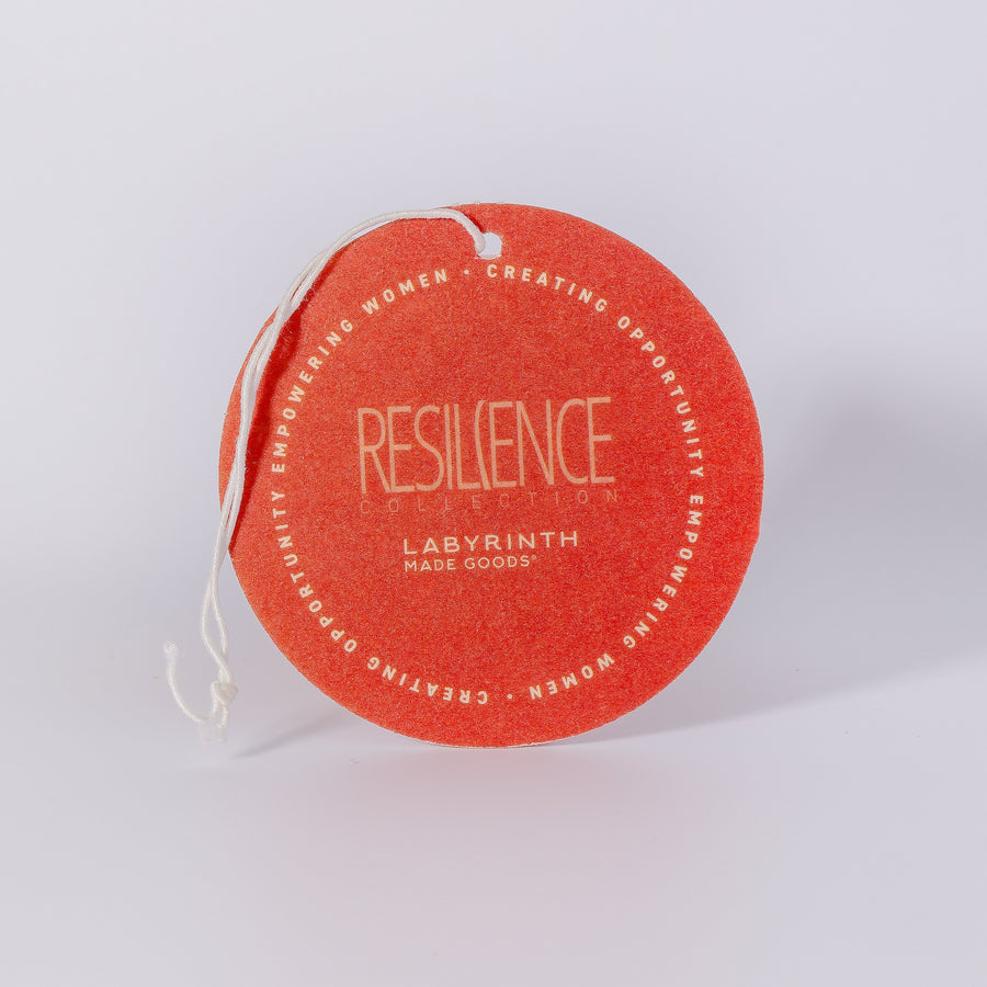 Luxury soy candle with warming amber, pumpkin, and ground clove, handcrafted in Illinois, resilience glass vessel, 60-hour burn time by Labyrinth Made Goods at brixbailey.com