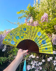 Bright yellow  'Luciferin' silk folding hand fan with flowers and mushroom painted artwork