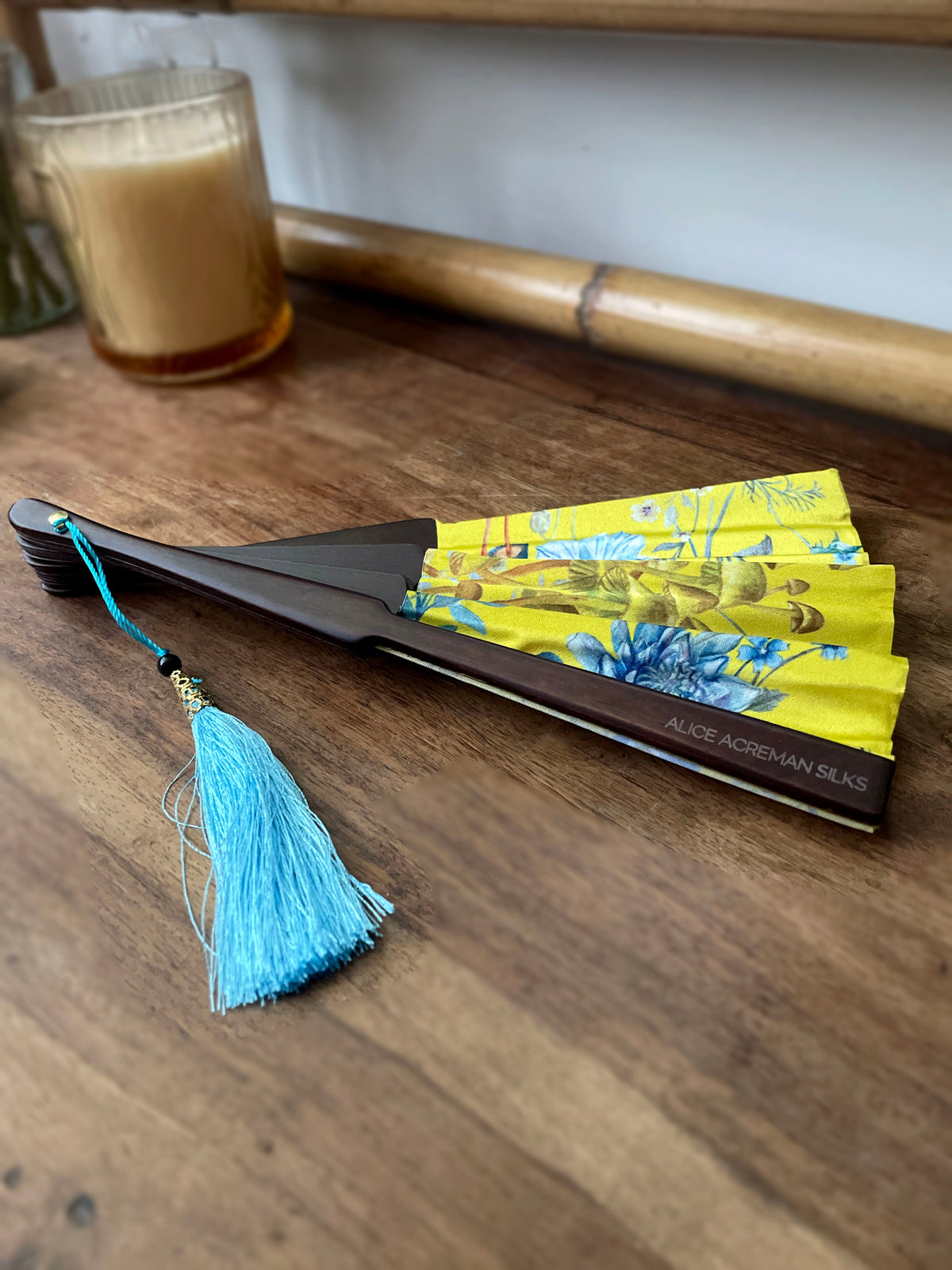 Bright yellow  'Luciferin' silk folding hand fan with flowers and mushroom painted artwork