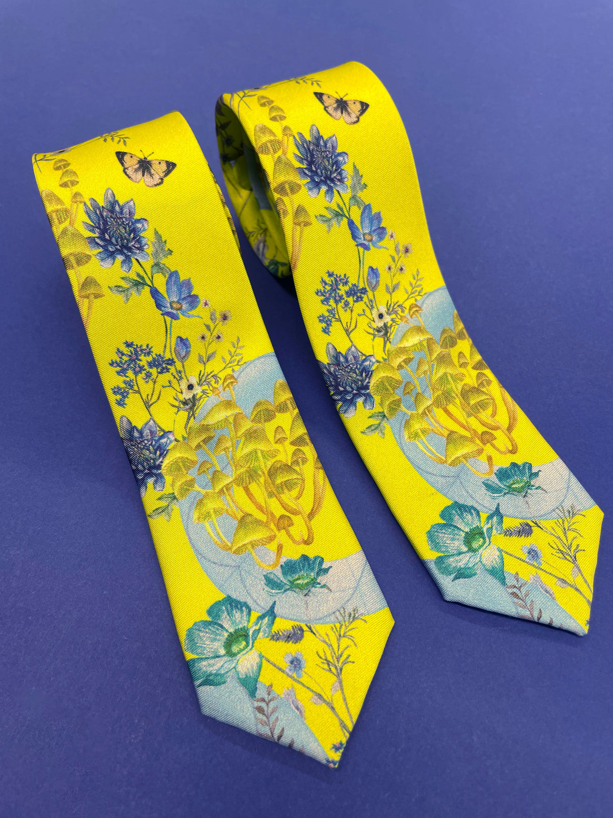 Vibrant yellow and pale blue ‘Luciferin’ floral silk tie