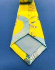 Vibrant yellow and pale blue ‘Luciferin’ floral silk tie