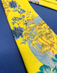 Vibrant yellow and pale blue ‘Luciferin’ floral silk tie
