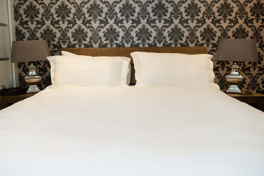 Luxury white organic cotton percale duvet cover, premium 360 thread count, ultra-soft and breathable, stylish king or double size by Karpāsa London at brixbailey.com