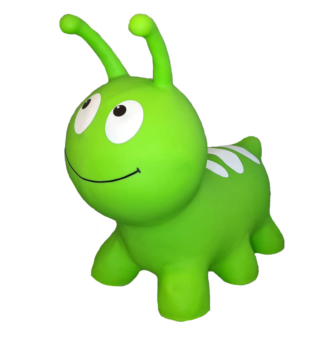 a toddler laughing while bouncing on a bright green wormy jumpy toy indoors
