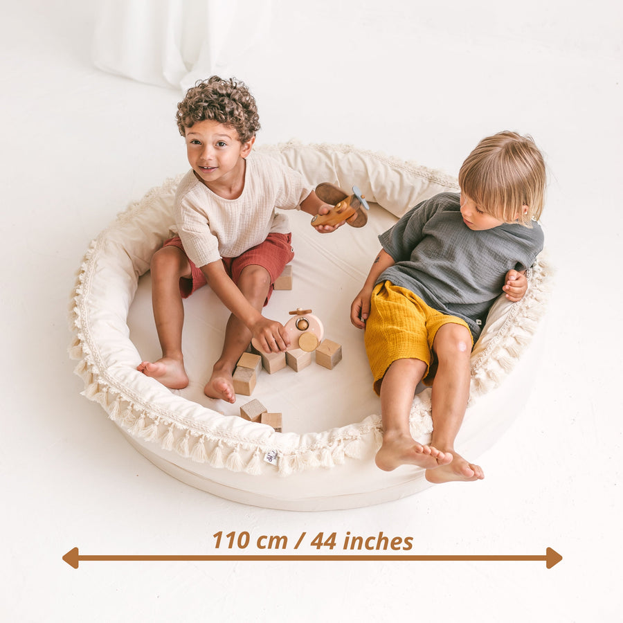 Round Kids Nest Play Mat - Versatile Lounger for Play & Sleep | Safe & Cozy by Minicamp at brixbailey.com