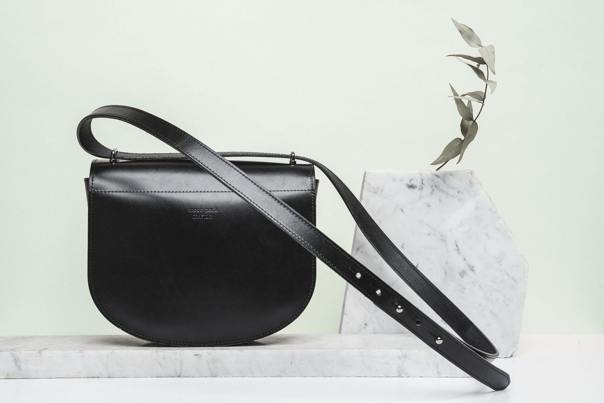Black Leather Moon Pack Handbag
