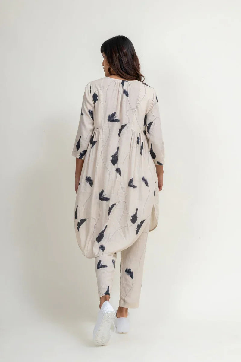 Luxury Naomi printed set, side paneled tunic with tapered cotton pants, cream printed upcycled cotton linen, best-selling stylish ensemble by Bethikal at brixbailey.com