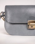 Zelma Kraft Classic Cut Saddle Bag – Timeless Leather Elegance by Zelma Kraft at brixbailey.com