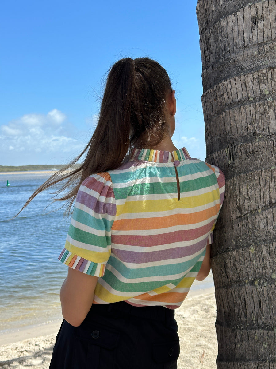 Luxury puff shoulder rainbow stripe cotton top with pleated neck and sleeve details by GILD at brixbailey.com