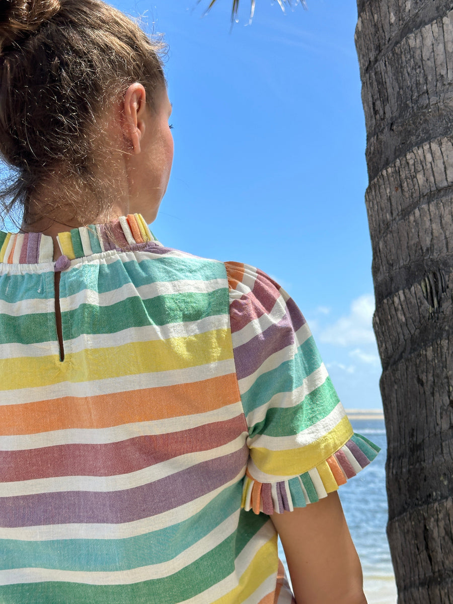Luxury puff shoulder top with pleated neck, rainbow stripes, premium hand-loomed cotton, stylish statement piece by GILD at brixbailey.com