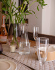 Premium organic cotton quilted table runner pair, stylish chambray weave, luxury dining decor, best-selling modern table setting by Karpāsa London at brixbailey.com