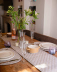 Luxury organic cotton quilted table runner pair, premium chambray weave, stylish modern dining decor, best-selling Black Friday deal by Karpāsa London at brixbailey.com