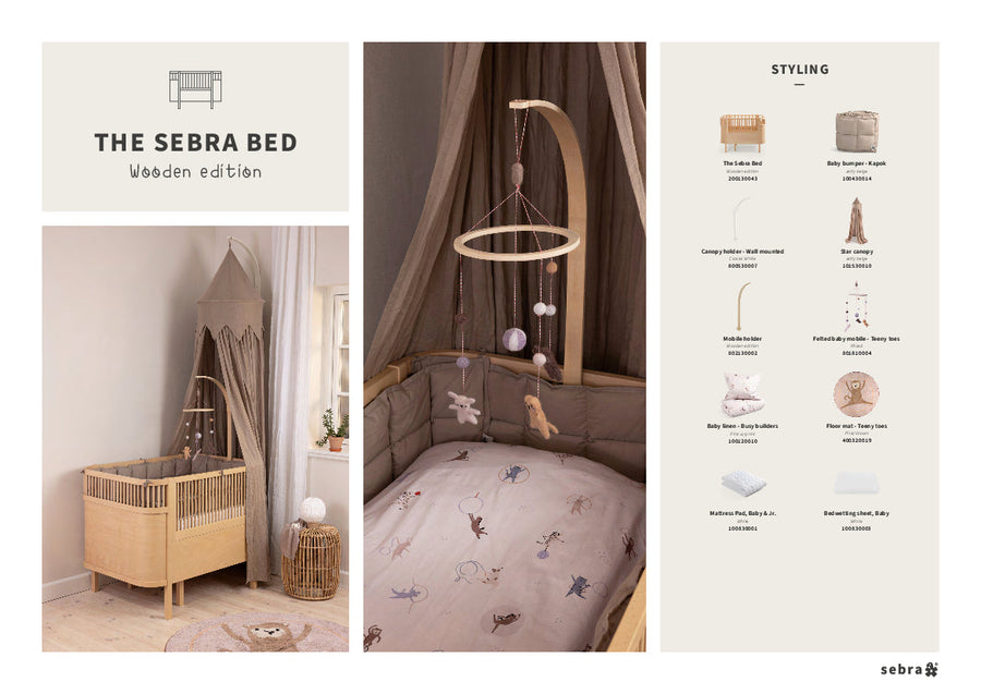 Sebra wooden baby and junior cot bed, luxury adjustable grow-with-me crib, premium handcrafted Danish design, best-selling for newborns to 8 years by Ella James at brixbailey.com