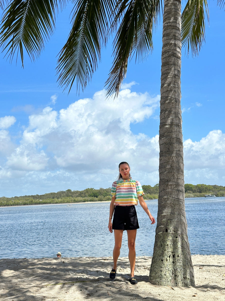 Luxury rainbow stripe puff shoulder top with pleated neck and sleeve details, handcrafted 100% cotton statement blouse by GILD at brixbailey.com