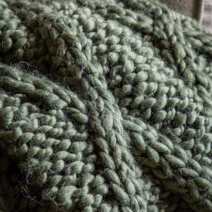 Luxury chunky cable knit throw in dark olive green, super-soft diamond pattern, premium cozy blanket for sofa or bed by Ella James at brixbailey.com