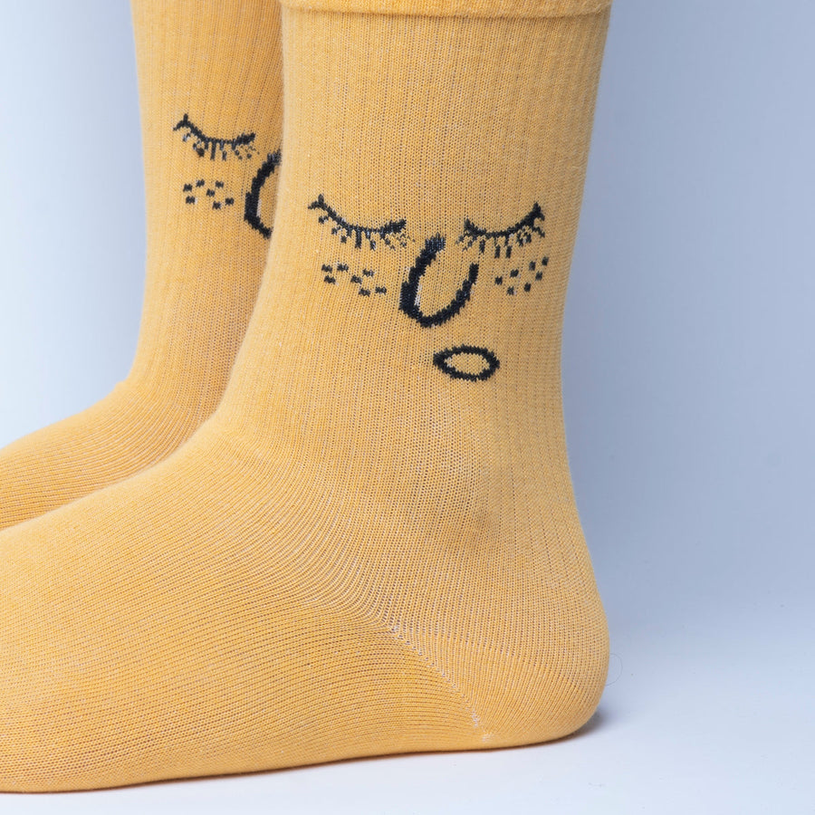 Premium yellow smiley face socks, luxury cotton blend, simple sophisticated design, sizes 37-42 EU, trending best-selling style by Body and I at brixbailey.com