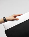 Handmade Leather Laptop Sleeve - Elegant & Eco-Friendly Protection by Stella Soomlais at brixbailey.com