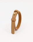 Elegant Double-Layered Leather Bracelet with Brass Fastener by Tairi Roosve at www.brixbailey.com