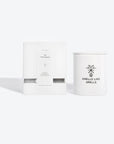 the empress tarot candle glowing elegantly in a soft-lit room with its hand-made porcelain container