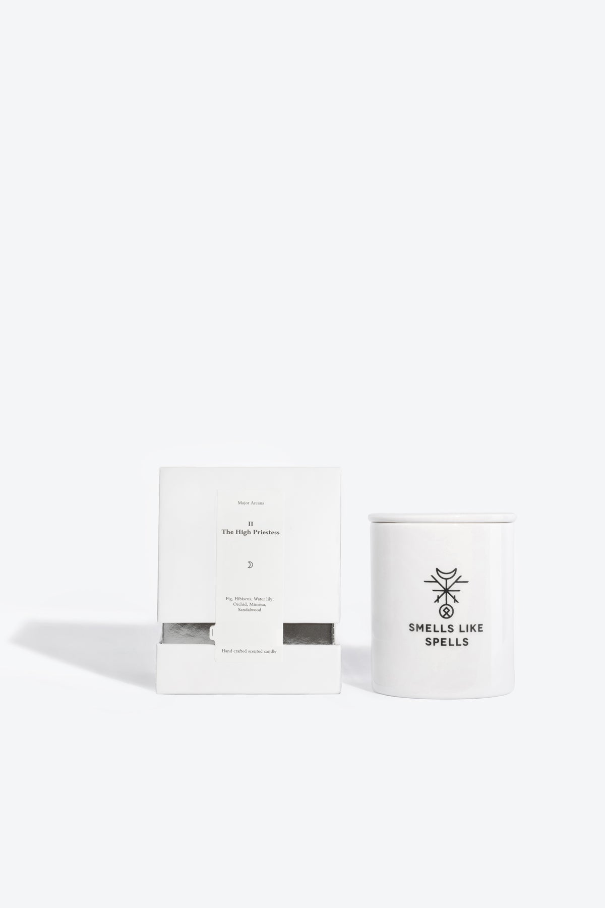 bold high priestess tarot candle glowing with mystical energy on a dark altar