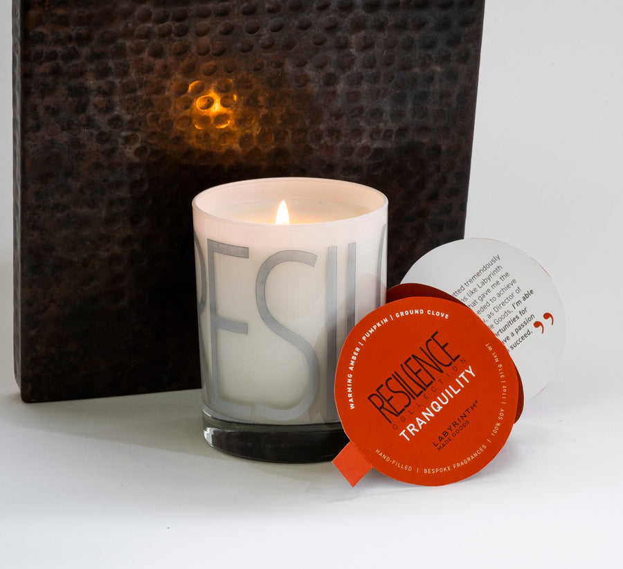 Luxury Tranquility scented candle with warming amber, pumpkin, and ground clove, handcrafted premium soy wax, long-lasting fragrance by Labyrinth Made Goods at brixbailey.com