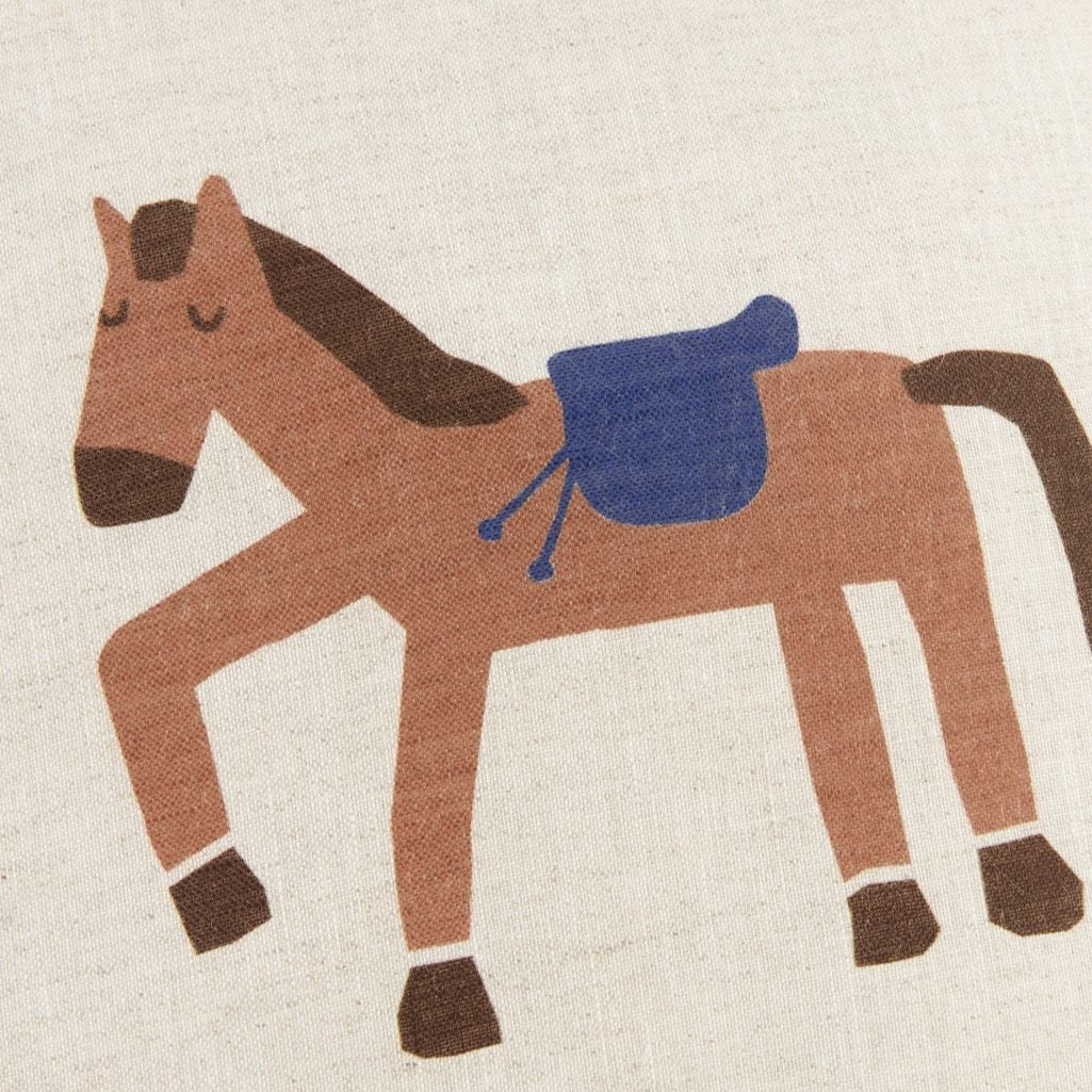 Premium linen horse cushion with blue saddle, retro style for kids bedroom decor by Ella James at brixbailey.com