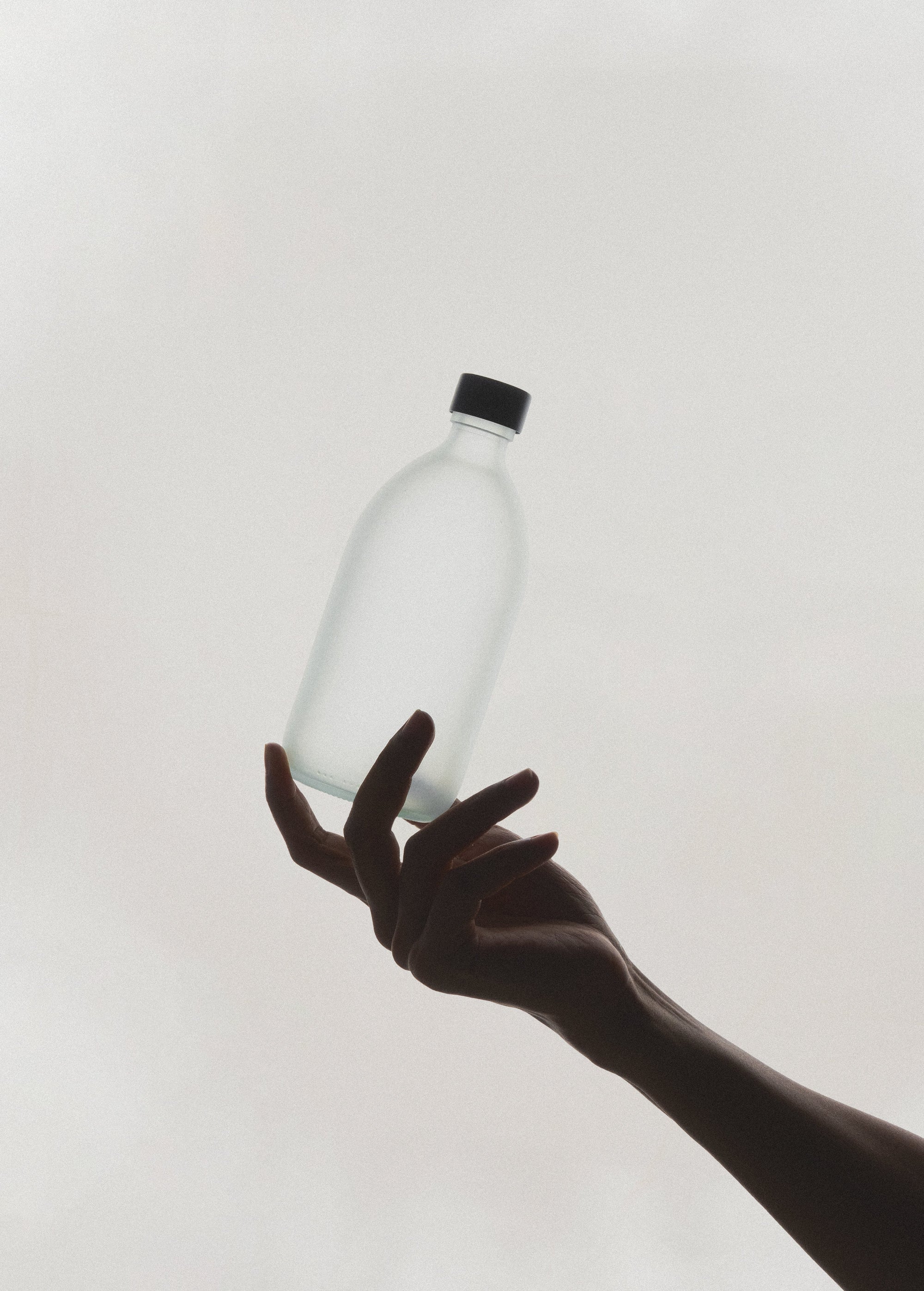 White Glass Bottle and Cap