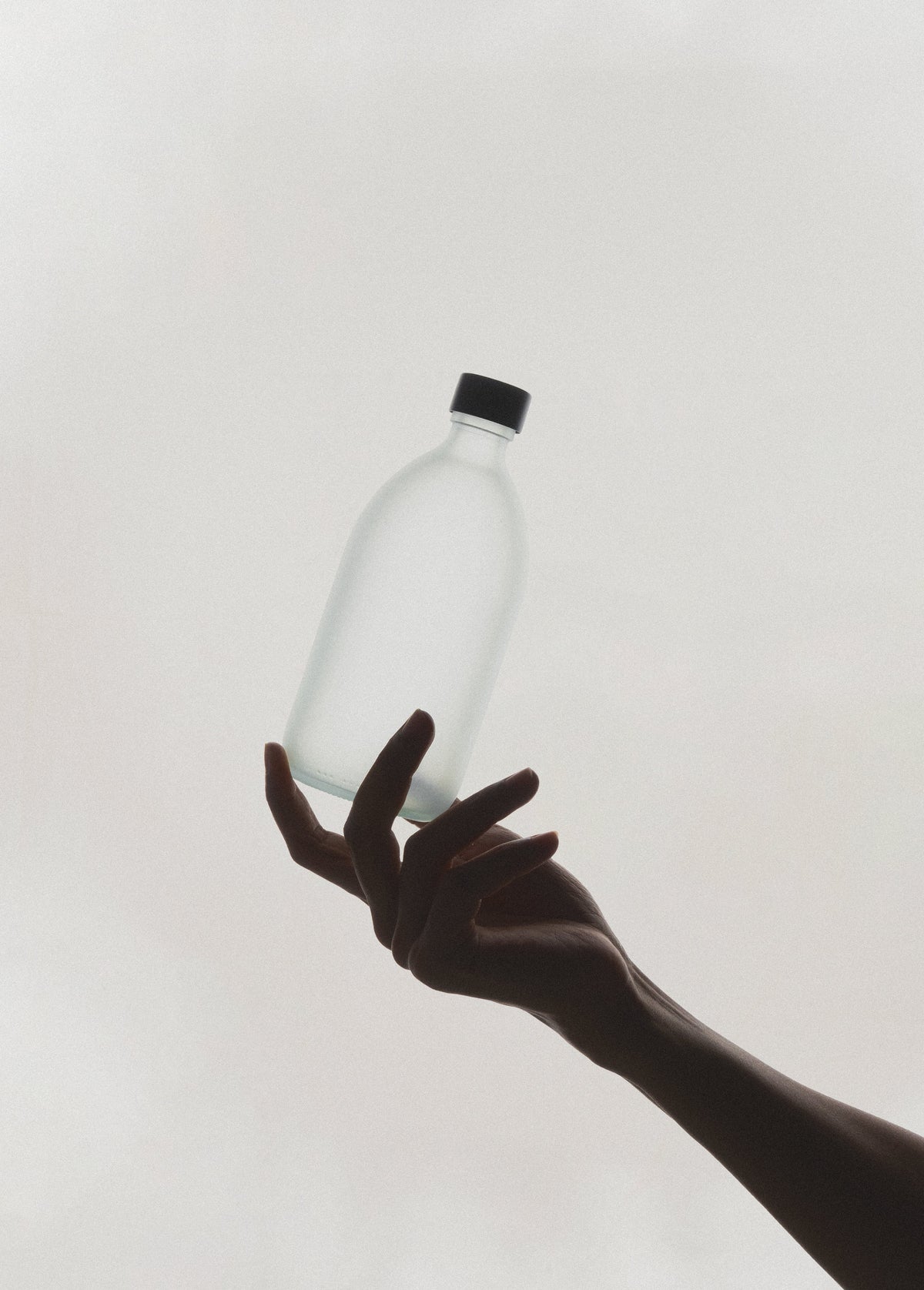 White Glass Bottle and Cap