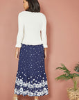 Yumi Ivory Tie Up Ribbed Cardigan With Frill Hem