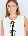 Yumi Ivory Knitted Waistcoat With Bow Trims