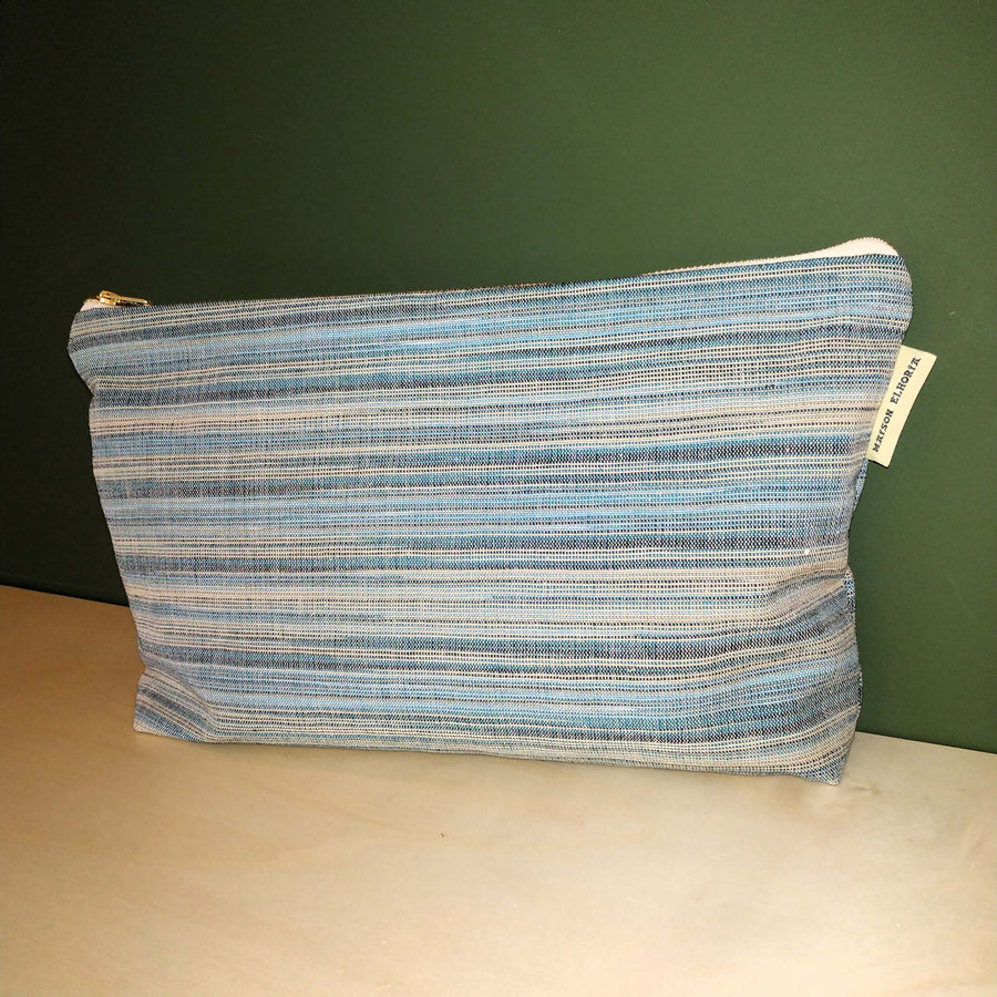 Premium Beach House Blue toiletry bag, large luxury travel organizer with water-resistant lining, handwoven cotton, secure 14-inch metal zip by Maison Elhoria at brixbailey.com