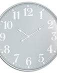 80cm grey metal wall clock with industrial minimalist design, casting dynamic light patterns by Sostter at brixbailey.com
