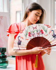 Floral Silk Fan with Toucan design and luxurious Gold tassel, part of the Mysa Collection