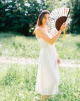 Floral Silk Fan with Toucan design and luxurious Gold tassel, part of the Mysa Collection