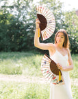 Floral Silk Fan with Toucan design and luxurious Gold tassel, part of the Mysa Collection