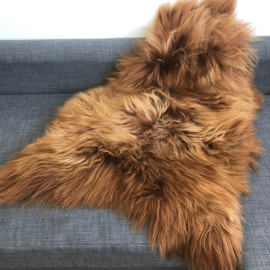 Luxury Icelandic Bronze Russet Sheepskin Hide, premium eco-dyed throw rug, warm natural fur, stylish home decor, best-selling sustainable by Wildash London at brixbailey.com