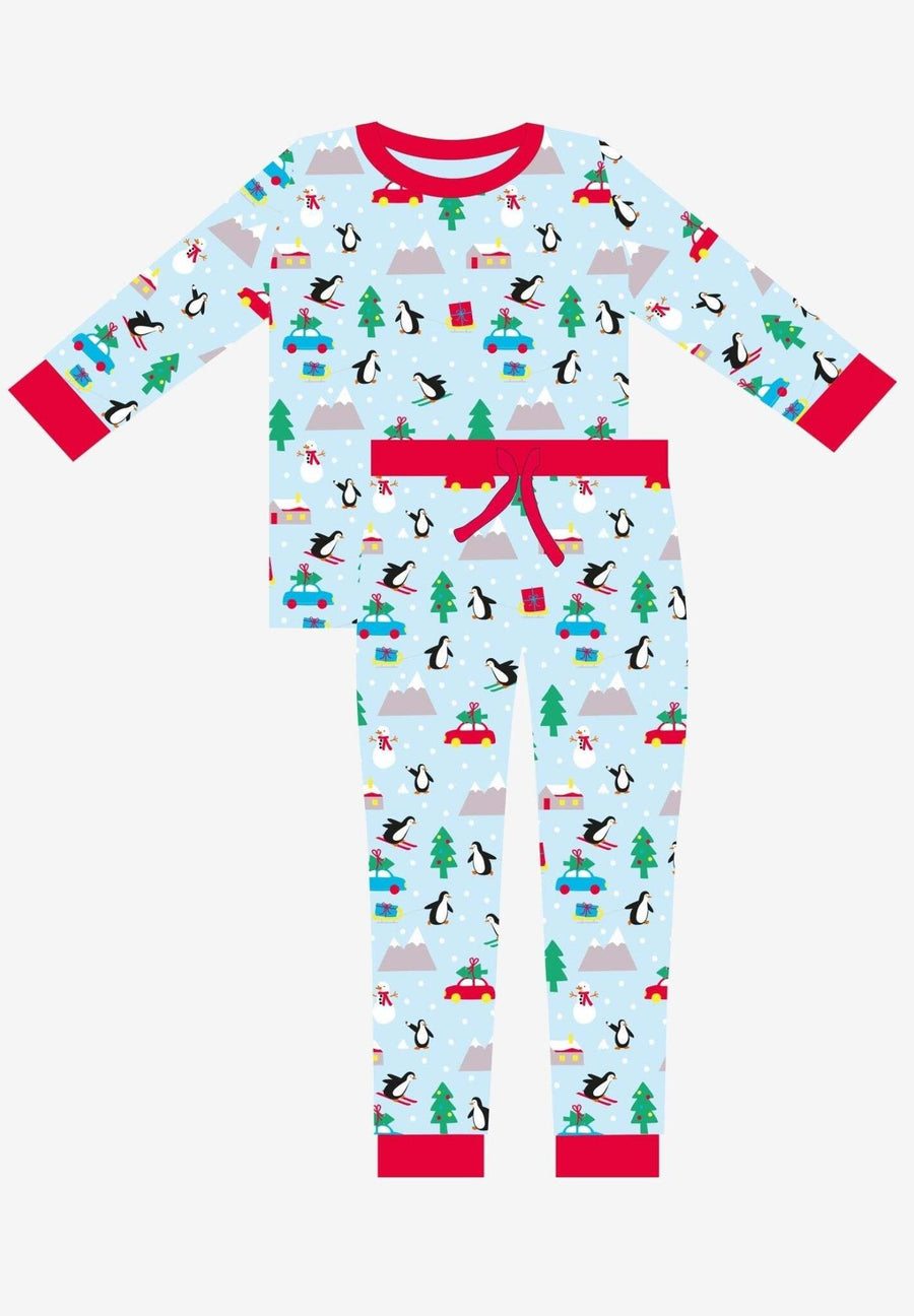 Premium Christmas pajama set for couples, cozy organic cotton sleepwear with penguin and snowman print, luxury matching holiday pajamas by Toby Tiger at brixbailey.com