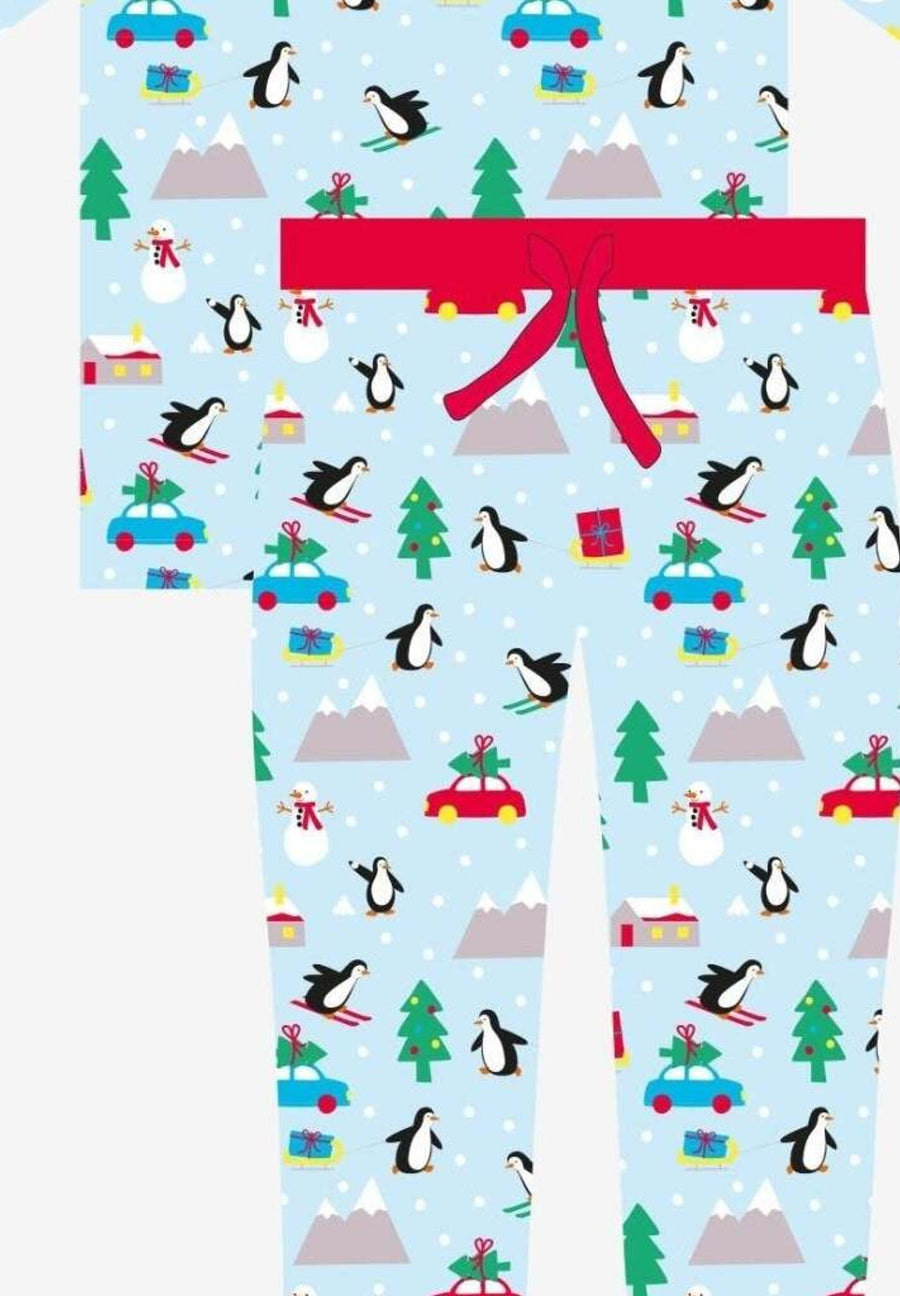 Premium Christmas pajama set for couples, cozy organic cotton sleepwear with penguin and snowman print, luxury matching holiday loungewear by Toby Tiger at brixbailey.com