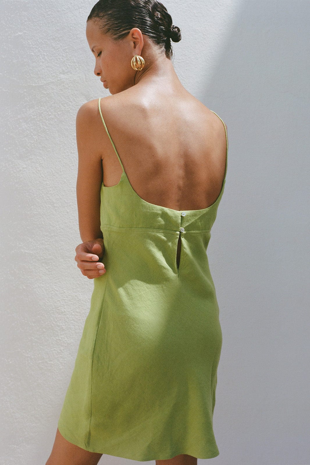 The Nicola Mini Slip Dress in apple green