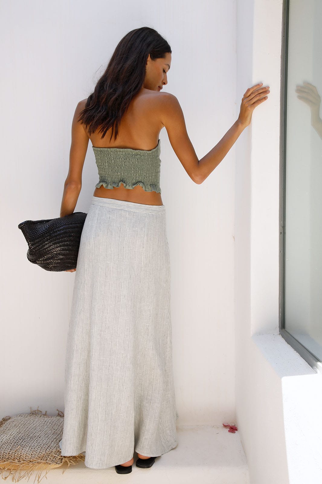 The Arabella Bias-Cut Maxi Skirt in striped olive green