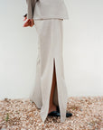 The Lena Wide-Leg Wool Trousers with side slit in beige