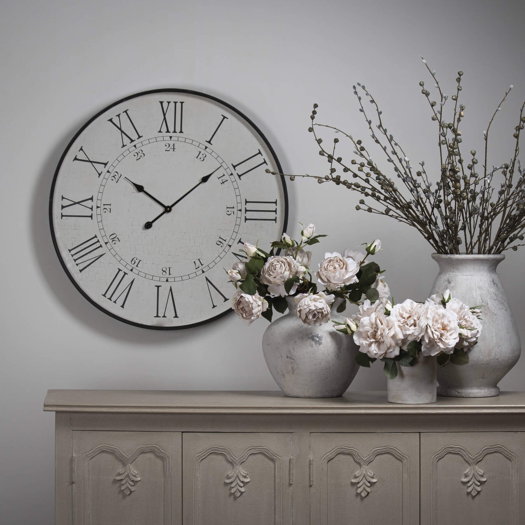 Large white wooden embossed wall clock with Roman numerals, 80cm diameter, traditional yet modern design by Sostter at brixbailey.com