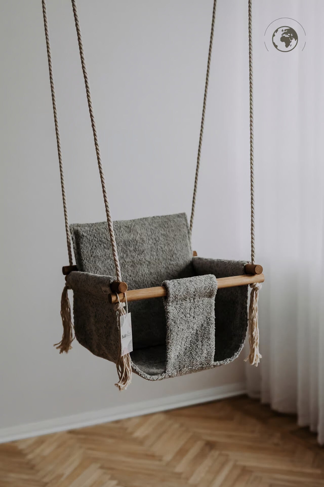 Discover Comfort and Sustainability with the Bouclé Cloth Baby Swing - Eco-Friendly & Safe for Children by Nofi KIDS at www.brixbailey.com
