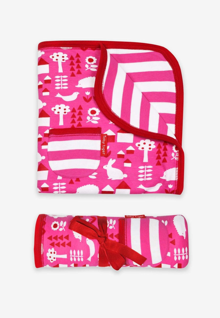 Premium organic cotton baby blanket, soft pink garden print, reversible design, luxurious handcrafted gift, cozy and stylish by Toby Tiger at brixbailey.com