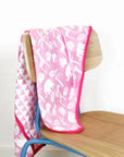 Premium Organic Cotton Baby Blanket for Sleeping, Cuddling, and Relaxation - Soft Two-Sided Design with Jungle Print and Triangles by Toby Tiger at brixbailey.com